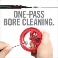 a person holding a red object with the words one - pass bore cleaning
